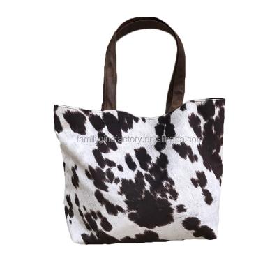 China Eco-Friendly Wholesale Monogrammed Women Leather Faux Cowhide Cowhide Print Tote Bag for sale