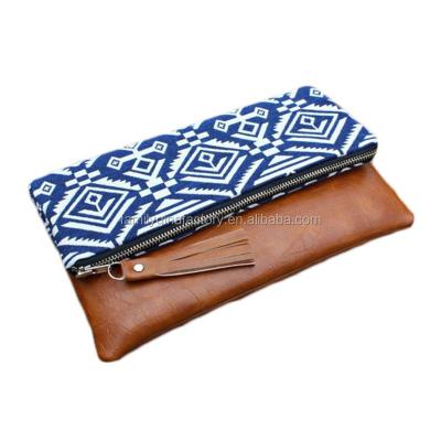 China Foldable Bag Wholesale Portable Monogram Designer Tribal Women Clutch Ladies Boho Leather Clutch for sale