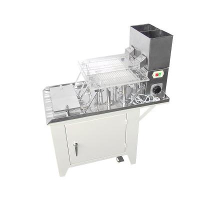 China Powder Granules Filling Machine Pharmaceutical Manual Capsule Filling Machine for sale