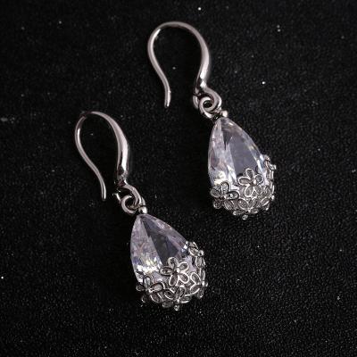 China WeSparking TRENDY EMO Water Drop Silver Zircon Dangle Fish Hook Earrings With Hollow Flower Charm For Women Fashion Jewelry for sale