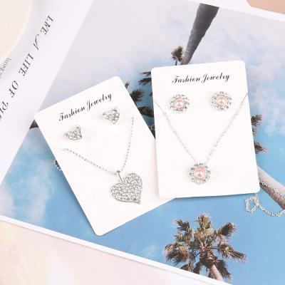 China WeSparking EMO Pearl Jewelry Sets Heart or Sunflower Shape Romantic Necklace Earring Set Fashion Diamond Jewelry for sale