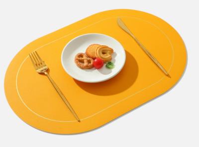 China Oval Western food mat with anti slip particle leather table mat, hotel home bowl mat en venta