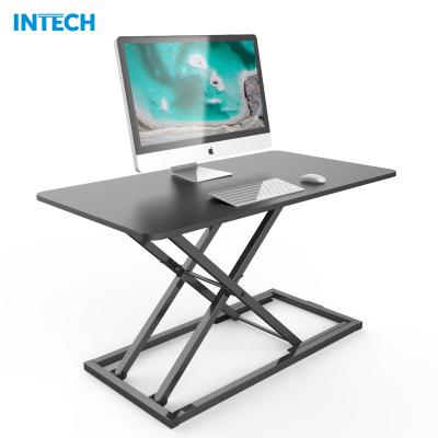 China Modern Height Adjustable Desk Converter Gas Spring Riser Sit To Stand Workstation Laptop Stand Desk for sale