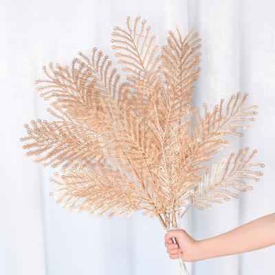 China New Year Wedding Party Plastic Flower Arrangement Gold Leaf Plant Peacock Simulation Gold Flower In Decorations for sale