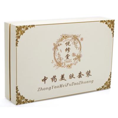 China Recyclable modern cream with gold gift box package cosmetic set for sale