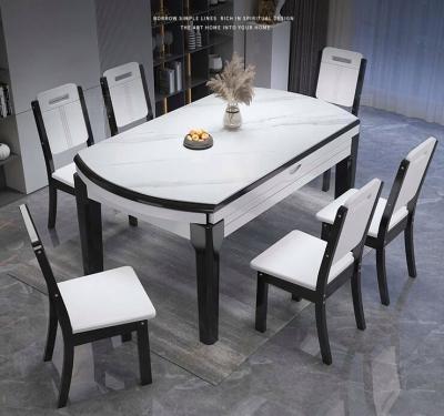 China 6 Seater Extendable Black and White Wooden Round Dining Table for sale