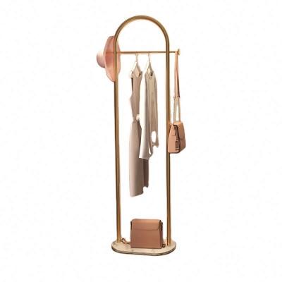 China Modern simple type light luxury creative metal floor living room bedroom Nordic simple and practical INS clothes gold coat rack hanger for sale