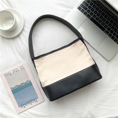 China Fashion wholesale women's bags pu leather ladies handbags fashion collision color women pinch tote bag canvas women's shoulder bags for sale