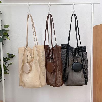 China Korean Korean version of the new fashion beach leisure women's creative mesh canvas tote bag trend money bag single shoulder package for sale