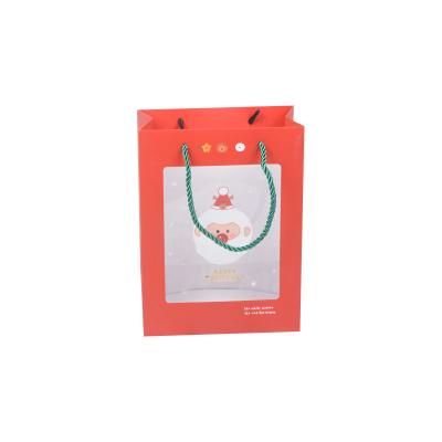 China Recyclable Custom Paper Bag With Clear PVC Window Christmas Gift Paper Bag for sale