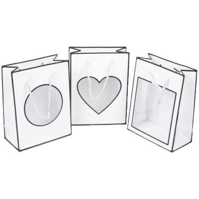 China Recyclable White Kraft Paper Bag With Transparent PVC Window Gift Packaging Bag for sale