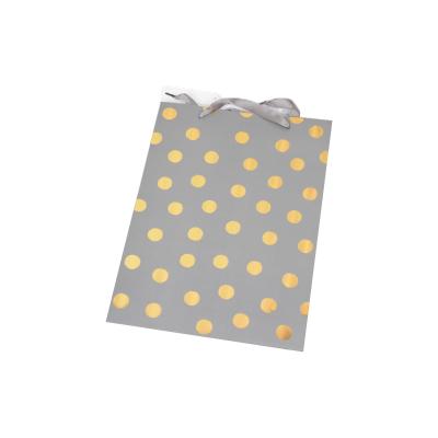 China Recyclable Gold Foil Stamping Paper Bag With Custom Logo Gift Paper Bag With Ribbon for sale