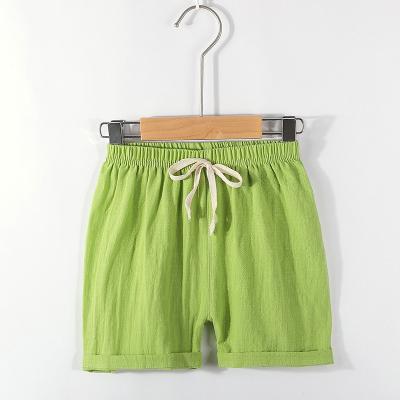 China Anti-wrinkle Summer Vacation Beach Kids Shorts Drawstrings Baby Boy Bloomers Shorts Kids Solid Canvas Summer for sale