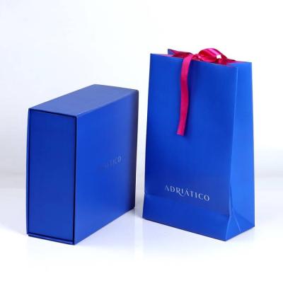 China Custom Materials Luxury Blue Folding Recycled Skin Care Packaging Paper Magnetic Large Size Gift Boxes And Bags for sale