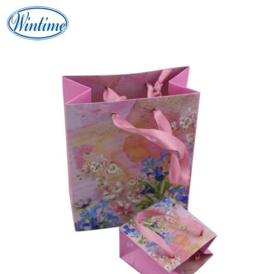 China Recyclable Recycle Ribbon Handle Shopping Paper Bag For Gift for sale