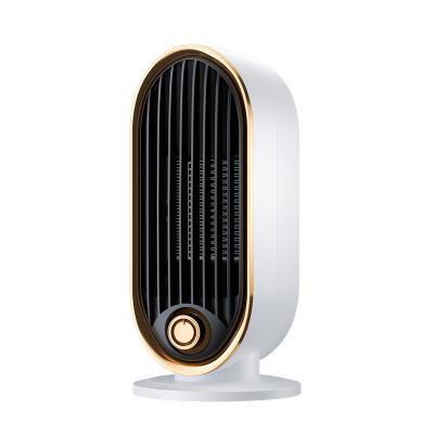 China Mini Portable Smart Fireproof Material Heater Home 700W Electric Fan Heater Fashion Fan for sale