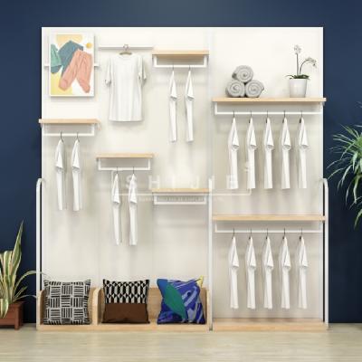 China SHIJIE Grocery/Supermarket/Retail/Pharmacy /Snack Shop Clothes Store Furniture Fixtures and Fittings Shops Show Rack Clothing Store Interior Design Ideas for sale