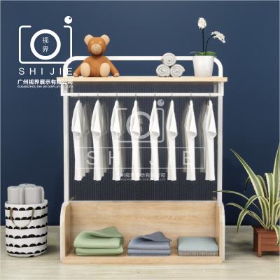 China Grocery Store /Snack Shop/Supermarket/Retail Store/Pharmacy Boutique Shop Fixtures Clothing Display Rack SHIJIE Rack Wooden Customized Clothing Store Display Furniture for sale