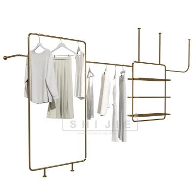 China Wholesale Store/Supermarket/Retail/Pharmacy Gold Metal Clothing Metal Wall Mount Display Stand Grocery /Snack Rack For Clothing Retail Store for sale