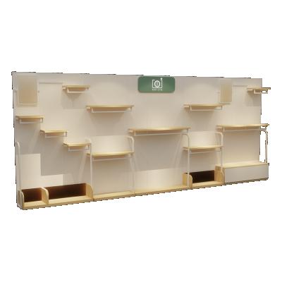 China Single Sided OEM Store Clothes Wall Shelves Female Wooden Display Rack for sale