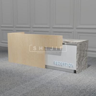 China SHIJIE Modern Reception Designs Office Front Counter Table Customer Service Expandable White Wooden Reception for sale