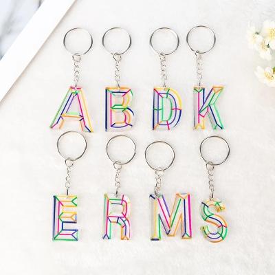 China Key Chains Women Keychains 26 Words Acrylic Handbag Rainbow Letter Keyring English Charms for sale