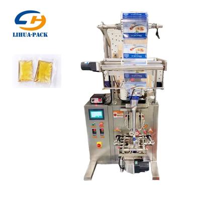 China Latest Design Large Food Packing Filling Machine For Soy Sauce Vinegar Oil Peanut Butter Sauce Packing Machine for sale