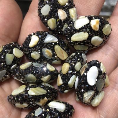 China 20x25mm Ceramic Paved Natural Colored Black Flat Oval Shell Chips Gunmetal Faux Stone Beads For Jewelry Making for sale