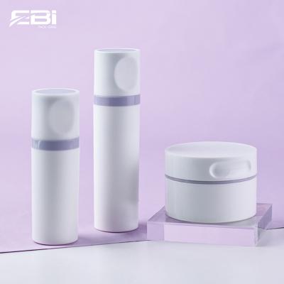 China Custom Cosmetic Packaging Purple Set Skin Care Lotion Bottle White Empty Pump Bottle, Cream Jar for sale