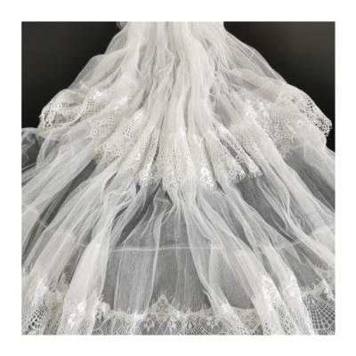 China Fashion Design Breathable Soft Hand Feeling Multiple Layers White Color Tulle Ruffles Fabric For Dress for sale