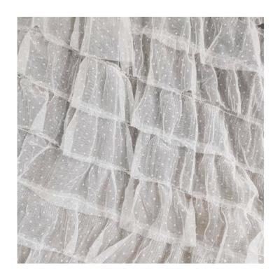 China Hot Selling Breathable Ready To Ship White Color Pleated Ruffled Tulle Fabric For Wedding Dress Wear for sale