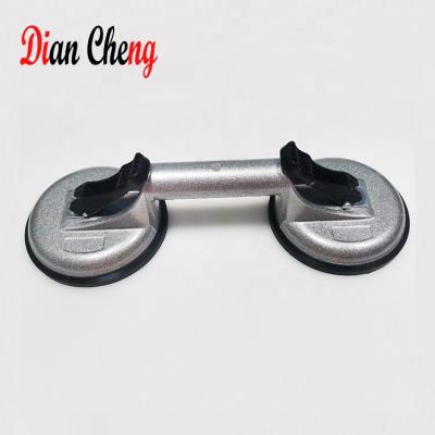 China Strong Power Aluminum Suction Cup 2 Jaw Vacuum Suction Cup Hand Tool For Processing Tile Glass Marble for sale