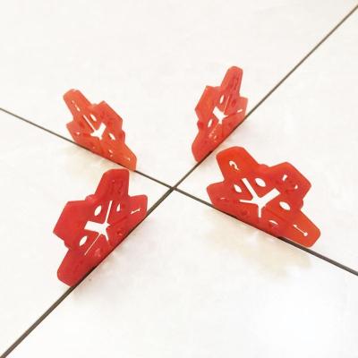 China Modern Multi Thickness Star Pentagon Tile Ceramic Plastic Red Spacer for sale