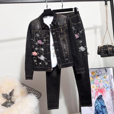 China 2021 new anti-pilling fashion women's denim suit beaded jacket fashionable two-piece stretch pants suit for sale