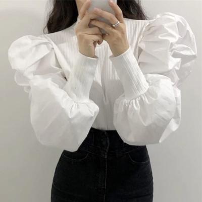 China New Spring Fashion Palace Wind Blast Sleeve Design Sweater Neck Solid Color Shirt Women Splicing Top Round Blouses Viable for sale