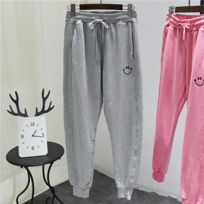 China Teenager Elastic Smiley Face Embroidery Casual Loose Pants Drawstring Waist Cotton Jogger Pants Women Plus Size Sweatpants for sale