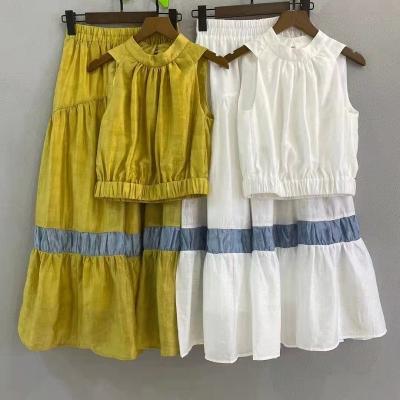 China Anti-Static Crop Sets 2022 Summer Fashion Springs 2 Piece Blouse Skirt Sets Ladies Hollow Out Crop Tops+Elastic Waist Sexy Long Maxi Skirts for sale