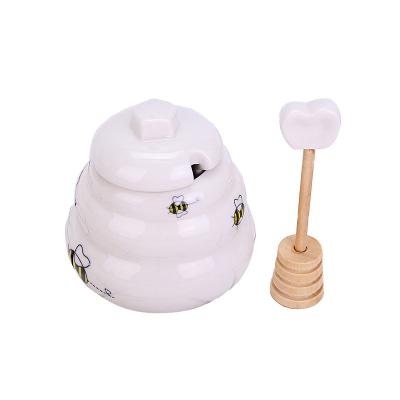 China Ceramic Honey Pot Airtight Gift Box Freshness Preservation Honey Pot Seasoning Pot with Wooden Dipper for sale