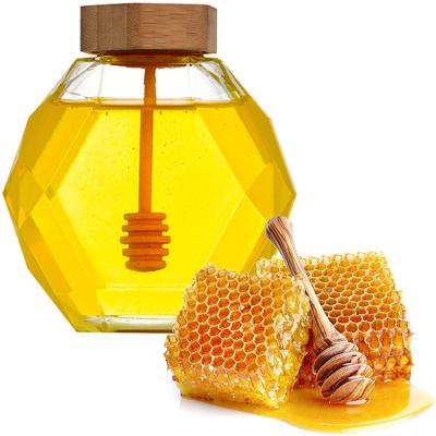 China Freshness Preservation Honey Jar Glass Hexagon Shape Honey Pot Container with Dipper and Cork Lid Cover Honey Syrup Beehive Wood Storage for sale