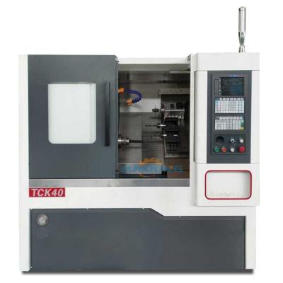 China Máquina de cuchillo inclinado de torno CNC TCK40 45 inclinado tipo banda blanca y negra 3500rpm en venta