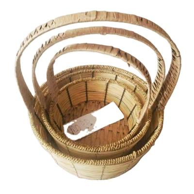 China Sustainable Handmade Natural Willow Basket With Handle Wicker Set Organizer Gift Storage Basket for sale