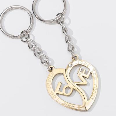 China Stainless Steel Key Chain Rolling Silver Rolling Stainless Steel Key Chain Fashion Love Key Chain Stainless Steel Rolling New Key for sale