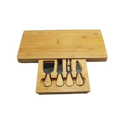 China Sustainable bamboo cheese serving board and 4 pieces of cheese knife with slide-out drawer for sale