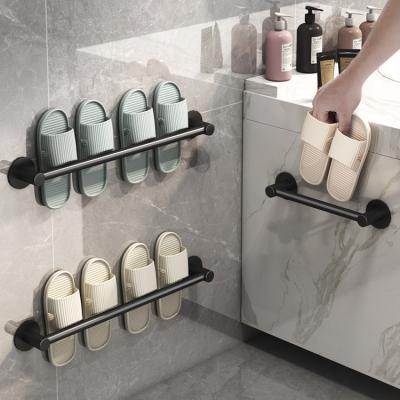 China Wall Mounted Artifacts No Punching Bathroom BRIEF Drain Toilet Storage Slipper Rack Hanging Shoe Rack Toilet Storage Rack for sale