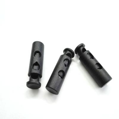 China Big Black Plastic Plugs Round Ball Rope Lock Toggles Spring 2-Hole Plugs 7mm Bungee Shock Rope for sale