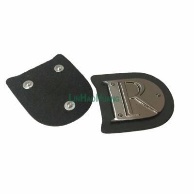 China Wholesale Black Nickel Free 38mm PU Leather Stitching Label On Alloy R Logo Icons Label Metal Badge Label for sale