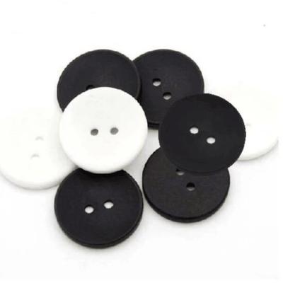 China Large Fashion 30mm Plastic Resin Nickel Free Sewing Buttons 2 Hole Matte Black Plastic Coat Buttons Buttons for sale