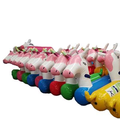 China PVC export to Australia manufacturer sell 0.9mm thicken pvc horse team building material inflatable game for kids and adults for sale