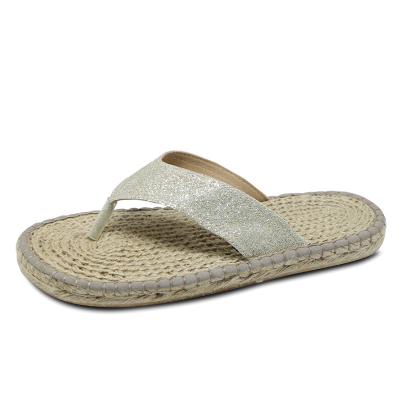 China Unique Breathable Straw Woven Outside Wearing Hemp Flip Flops Travel Women's Flat Sandals Beach Fashion Women's Slippers for sale