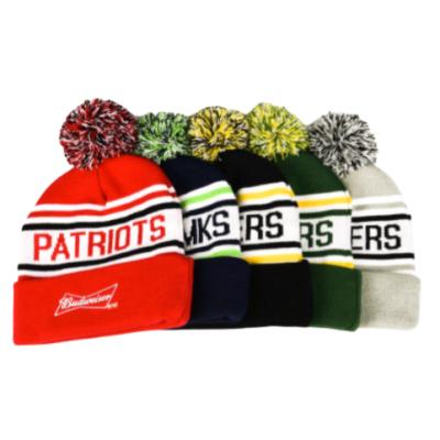 China Custom Embroidery Logo Pompom Knitted Hat Beanie Jacquard Cuff Letter COMMON Factory To Keep Warm for sale